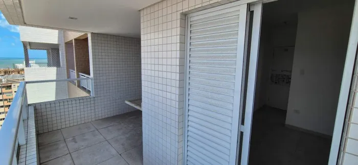 Apartamento à venda na Aviação, Praia Grande-SP | 2 suítes, varanda gourmet e 2 vagas