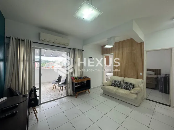 Apartamento com varanda e lazer a 250m da praia na Enseada, Guarujá