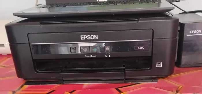 Vendo impressora Epson sublimação com folhas e tinta 550.00