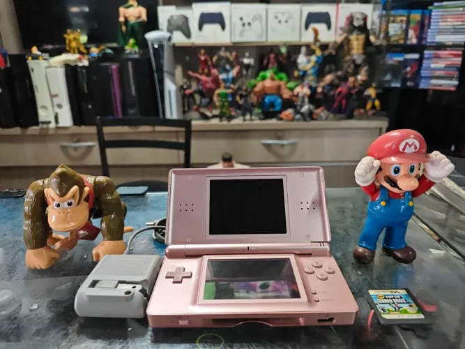 Nintendo dsi rosa 1 jogo impecável sem nenhum arranhão estado ac trocas...