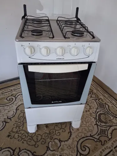 Fogão Atlas, usado mas funcionando normalmente as bocas e o forno. Entrego.