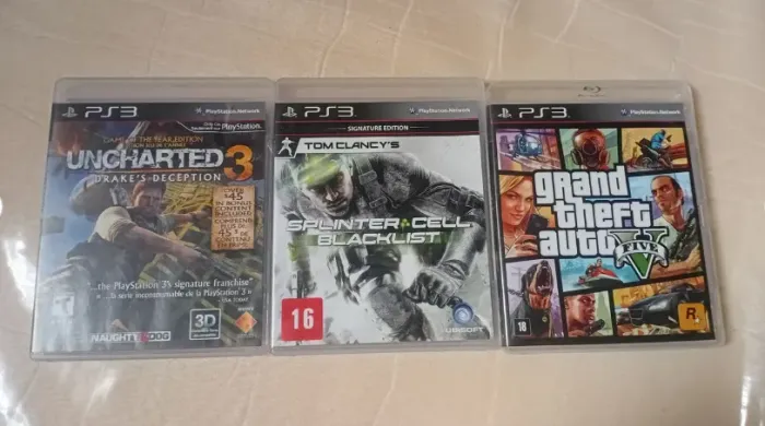 3 Jogos PS3 - Uncharted 3, Splinter Cell Blacklist e GTA V Usados