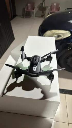 Drone que faz gravação e tira foto 