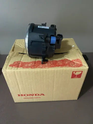 Vendo farol de milhas para o Honda City, original, novo, na caixa. 