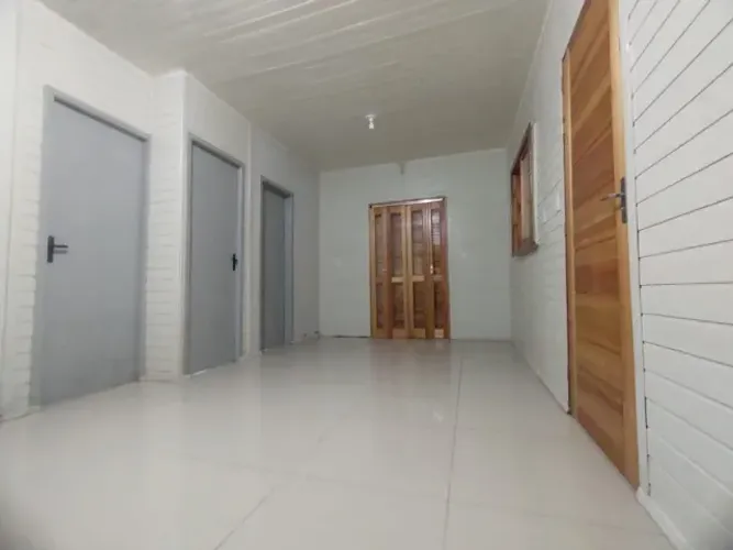 Casa 2 suítes com churrasqueira e pátio