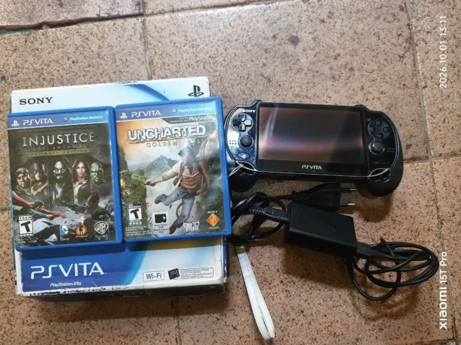 PSVITA COM 32GB E DOIS JOGOS LEIA TUDO