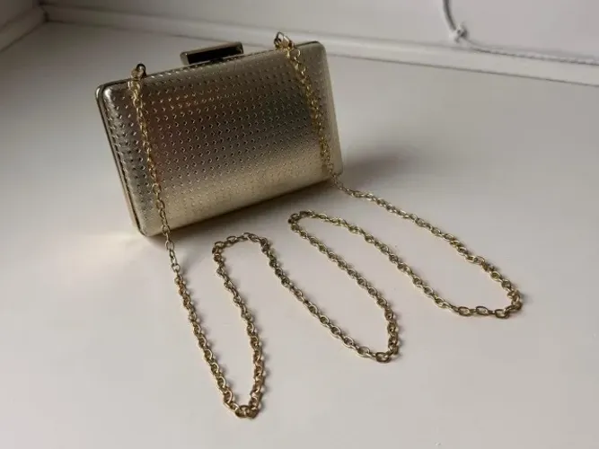 Bolsa festa clutch texturizada dourada