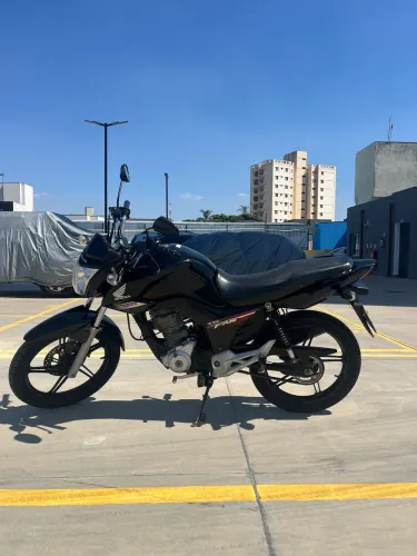 Motocicleta praticamente original único dono c/ manual estou pedindo  preço R$11.700,00 
