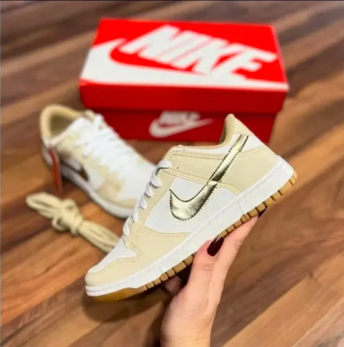 Tenis da Nike Dourada