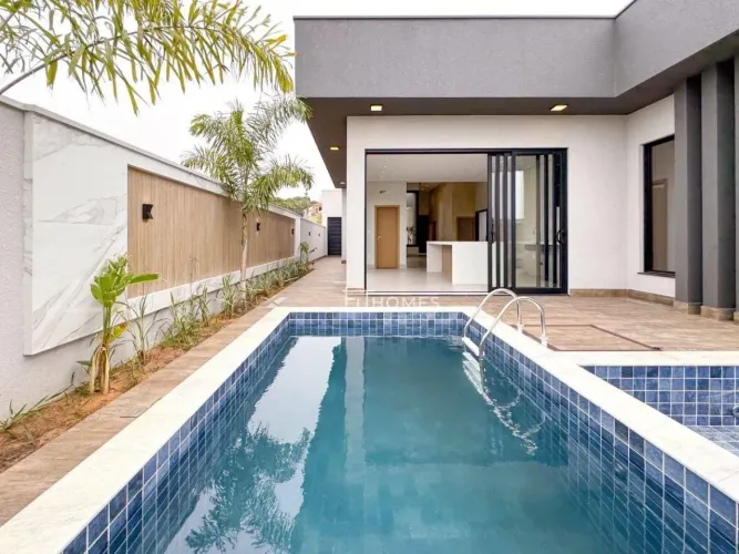 Casa com 3 dormitórios à venda, 207 m² por R$ 2.250.000,00 - Condomínio Villa Sapezal - In