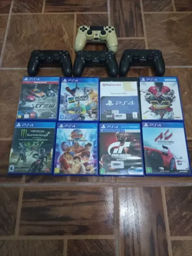Lote de jogos de ps4 e controles no estado 