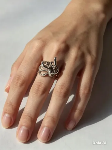 Anel floral em prata revestido ouro.