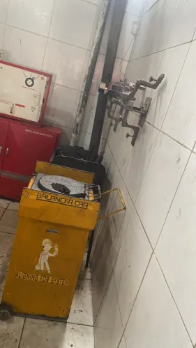 MÁQUINA DE ALINHAMENTO COM MÁQUINA DE CAMBAGEM 