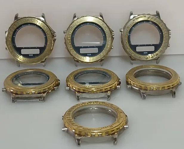 Lote com 7 caixas de relógio com escala taquimétrica