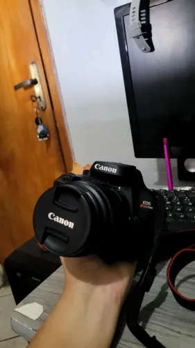CANON T100 