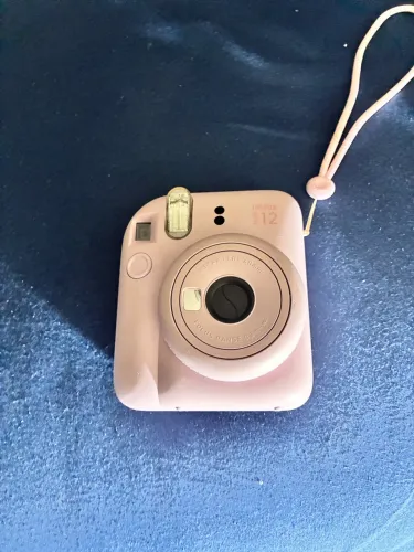 Vendo uma câmera instax mini 12 blossom Pink.