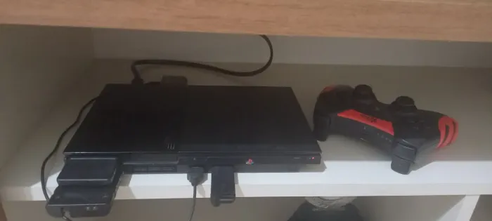 Ps2 tunado com mais de 40 jogos em ótimo estado e muito bem conservado