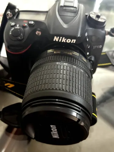 Câmera fotografica profissional Nikon D7100 com Lente