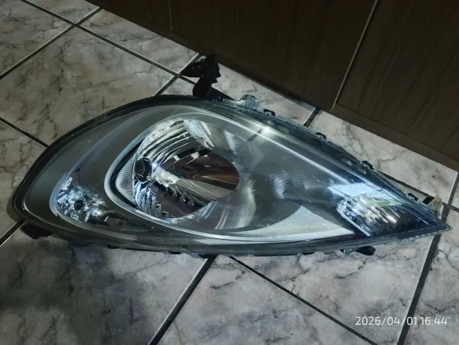 Farol Honda Fit 09/11