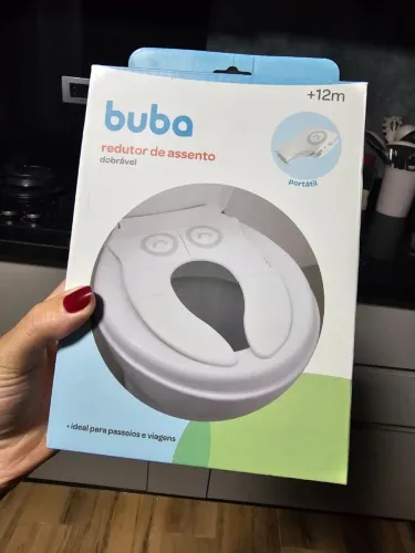 Vendo redutor de assento dobrável buba