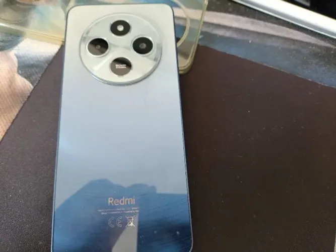 Vendo Telefone Redmi 14 C com caixa