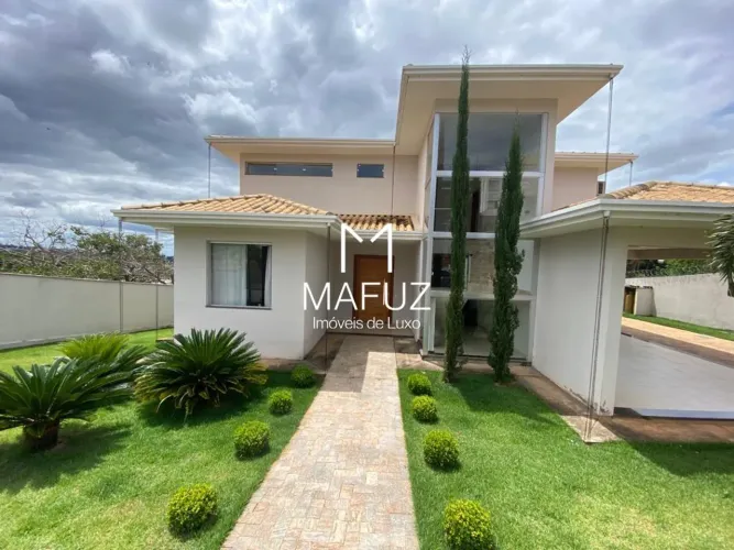 Casa com 4 dormitórios à venda, 540 m² por R$ 2.550.000,00 - Condomínio Encanto da Lagoa -