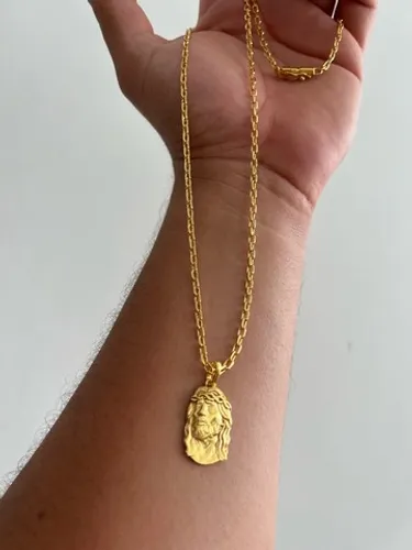 Cordão Cartier com pingente de Jesus 