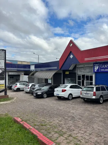 Loja em centro comercial c/ estacionamento