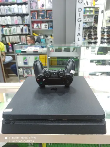 Ps4 Slim 1TB de armazenamento, um controle e um jogo + garantia