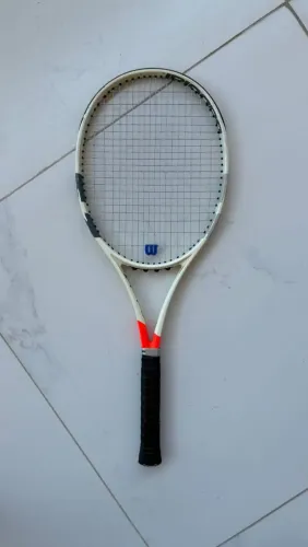 Raquete de tennis