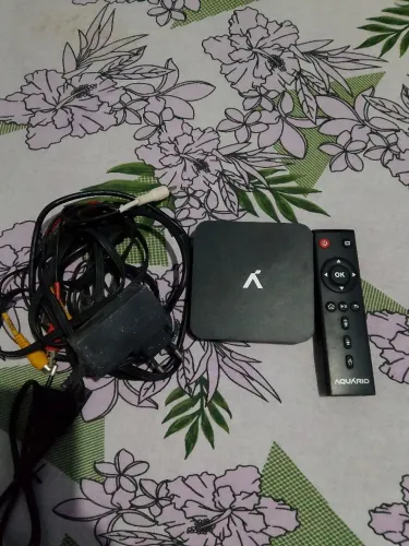 O dispositivo selecionado na imagem é o Aquário Smart TV Box 4K Plus (modelo STV-3000