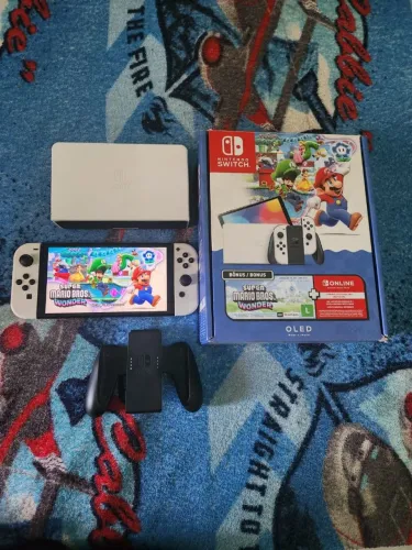 Nintendo Switch OLED 64GB + jogo Mario Wonder Completo nota fiscal garantia