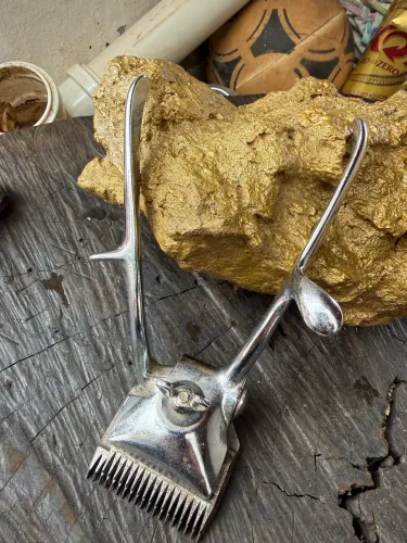 Máquina de cortar cabelo antiga