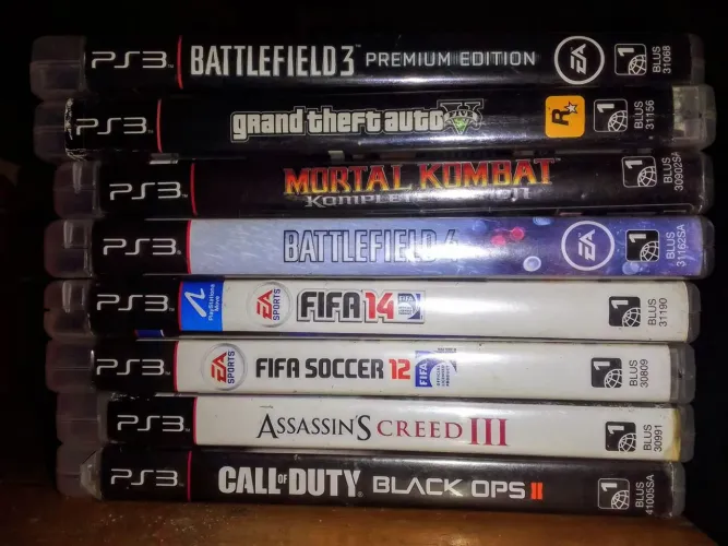 Jogos GTA V, Black Ops 2 e Mortal Kombat.<br>Grand Theft Auto V