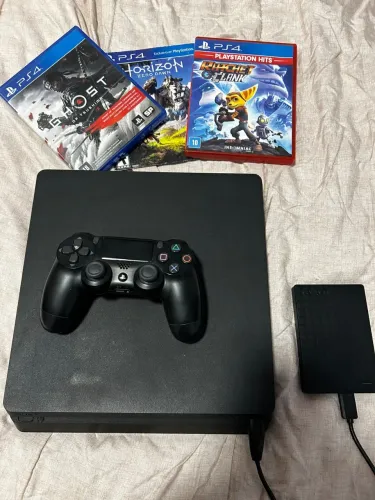 ? PS4 Slim 500GB + HD Externo 1TB + 3 Jogos