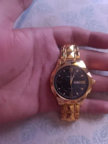 Relógio semi novo dourado