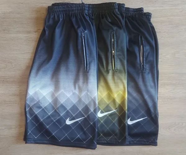 Kit com 3 Bermudas Nike - impecáveis 