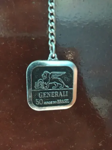 Chaveiro antigo Generali cia. nacional de seguros 50 anos no Brasil