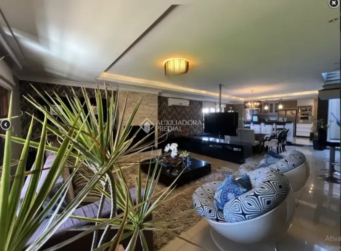 Lindo sobrado com 4 quartos, sendo 3 suítes, piscina, salão de festas, próximo a Unisinos