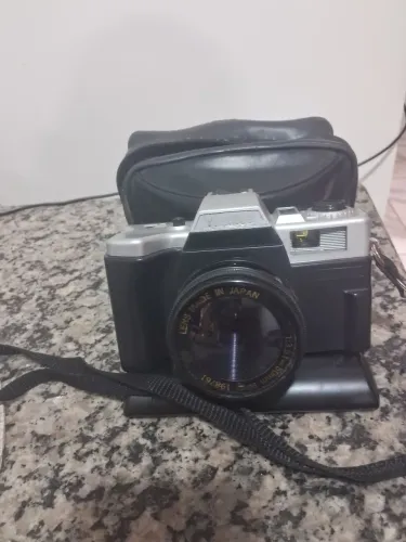 Máquina fotográfica.