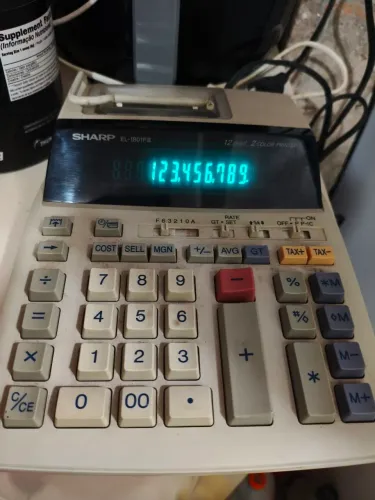 Registradora calculadora Sharp EL 1801V