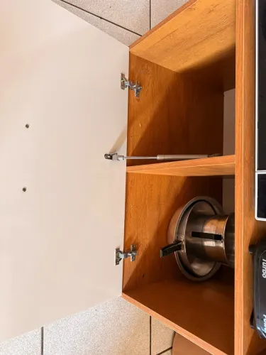 Armário do cooktop e o fogão 