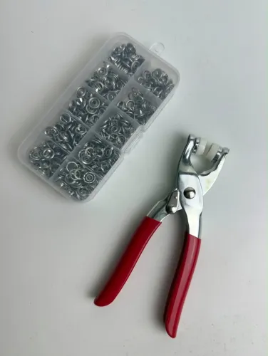 Alicate aplicador de botões