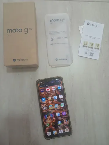 Celular moto G 35 usado em perfeito estado de conservação cor verde na caixa sem car