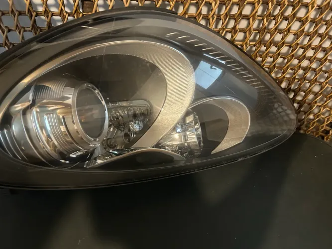 Farol Porsche Cayenne
