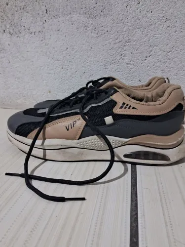 Tenis de corrida