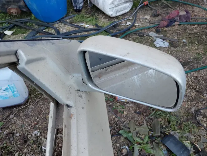 Retrovisor Santana até 96 lado direito manual