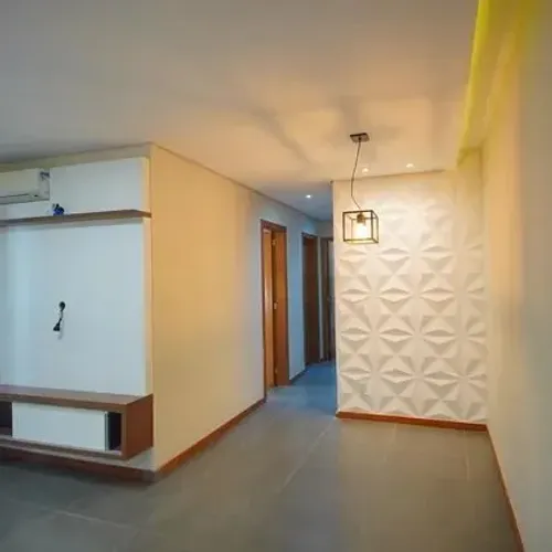 Apartamento com 3 dormitórios, suíte, sacada e churrasqueira.
