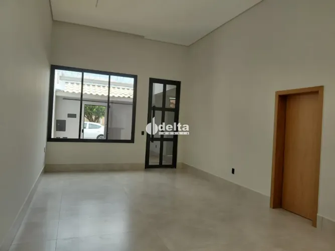 Casa residencial com 3 suítes disponível para venda no bairro Jardim Patrícia em Uberlândi