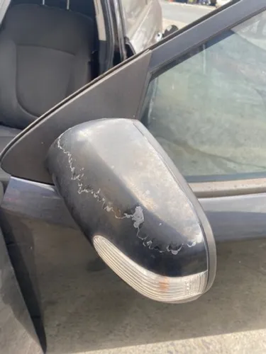 Retrovisor cerato lado esquerdo  usado com seta